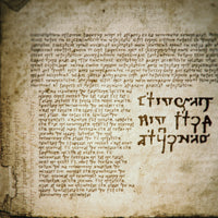 promotional image displaying the arcane cipher font on an old and ancient looking parchment