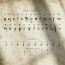 An ancient looking piece of paper covered in archaic glyphs, used as a promotional image to advertise the arcane cipher font