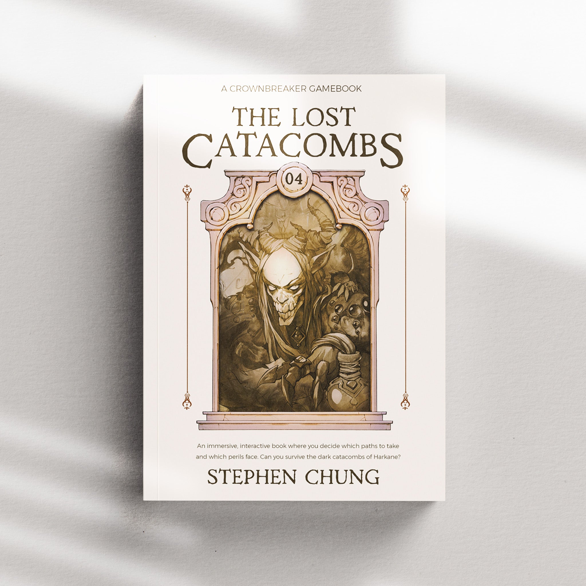 top down view of a fantasy novel with title and authors name set in the folklore font