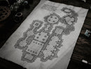 A dungeons and dragons map prop laid out on an old wooden desk