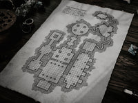 A dungeons and dragons map prop laid out on an old wooden desk