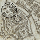 A fantasy map created on ivory paper with a circle magnifying a small section and showing the detail of the buildings