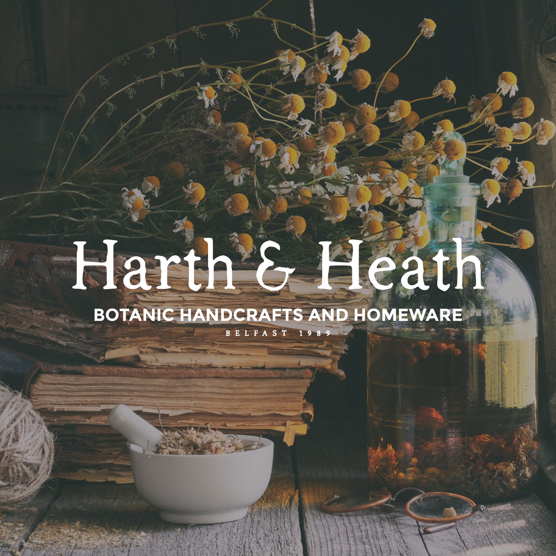 Image of apothecary table and the name Harth and Heath written on top using the Folklore font