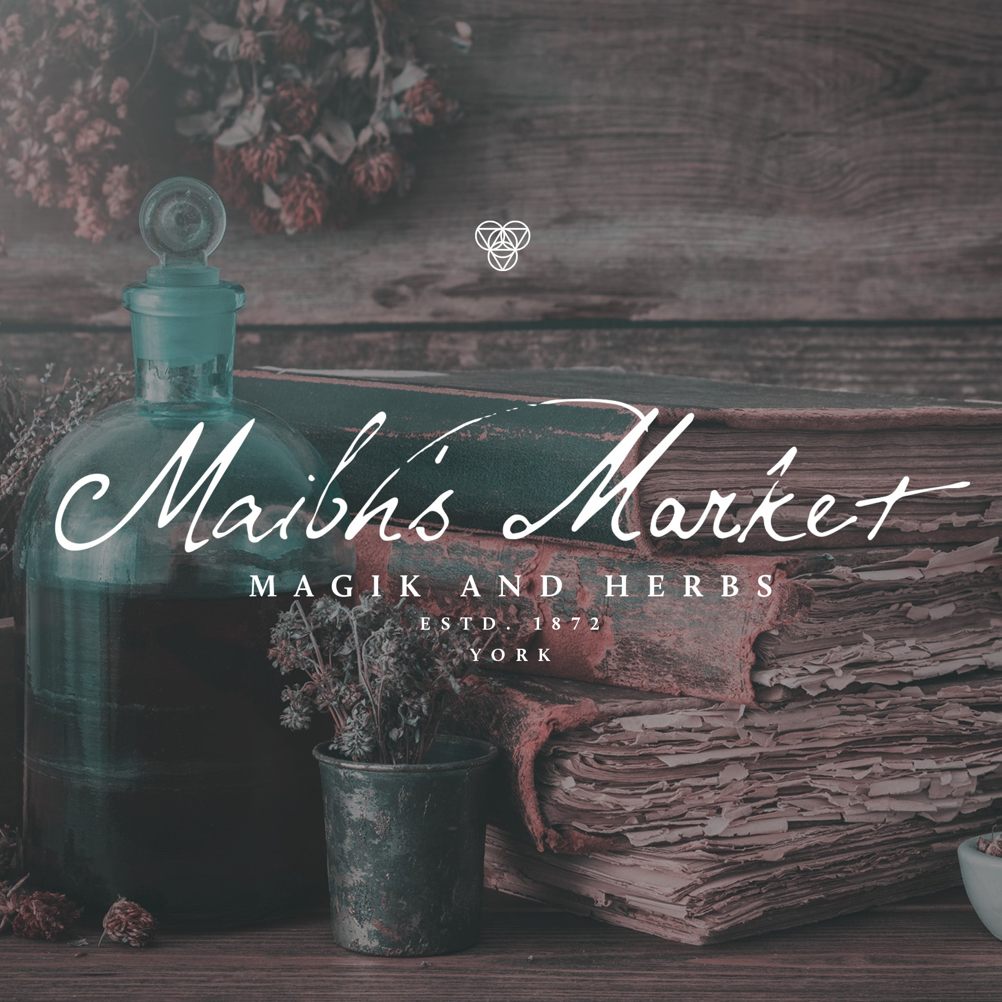 Image of an old bookshelf with the words Maibh's Market written in white. It is a fictional advert to showcase the mythshire font. 
