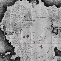A black and white hand drawn fantasy map is labelled using stylized icon symbols