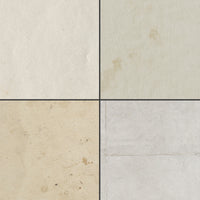 An image divided in quarters, each showcasing a free aged paper texture