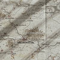 A fantasy map drawn on old paper contains various towns and villages all labelled with Aesoterik's settlement icon brushes, to create a medieval aesthetic