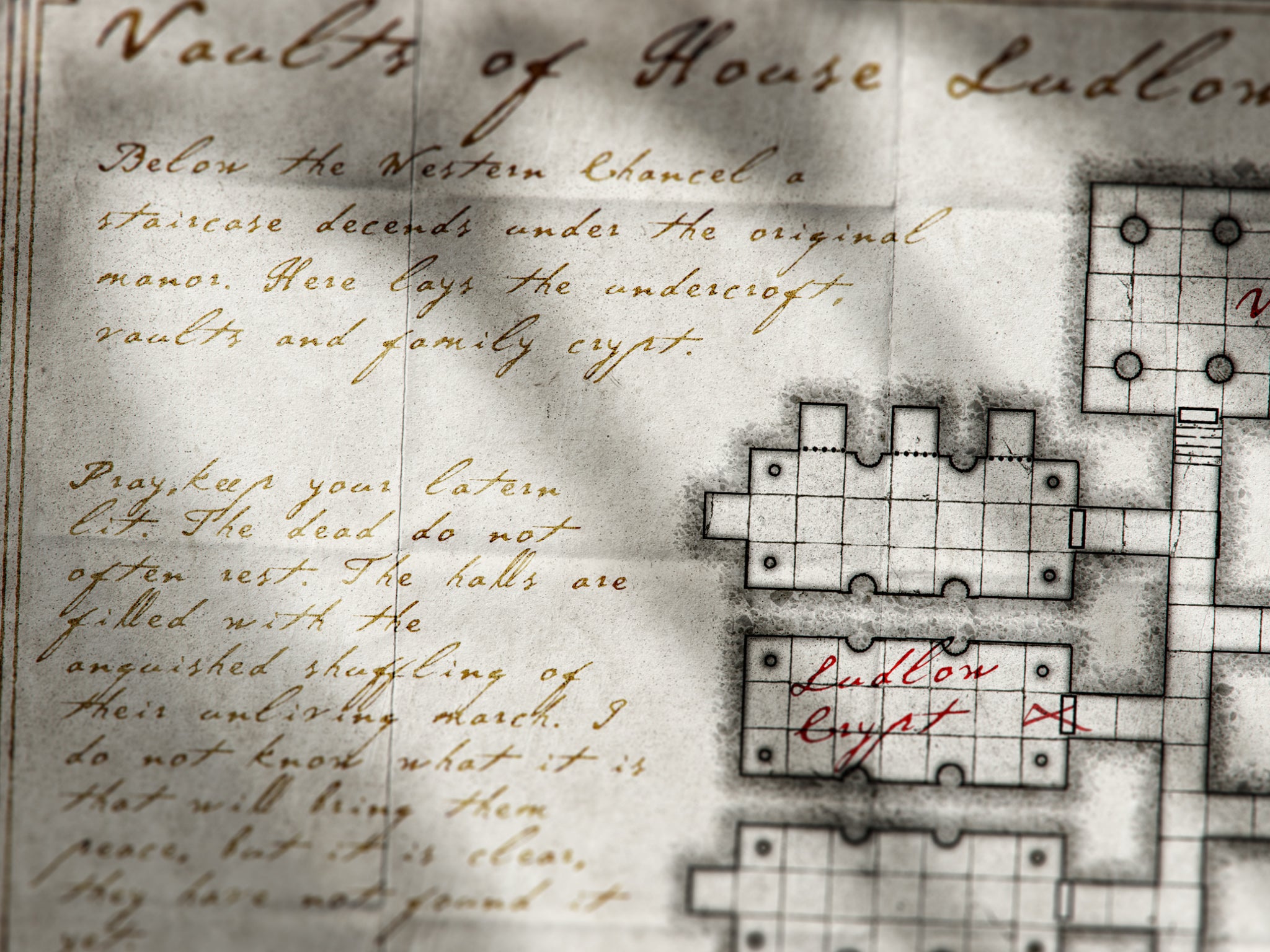 Detailed fantasy map and handwritten fantasy font illustrating an old tomb