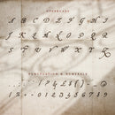 The uppercase characters of New Regent Quill shown on an old paper background
