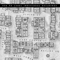 A black and white digitally created fantasy map of a town with label icons used to quickly describe the building and trade types 